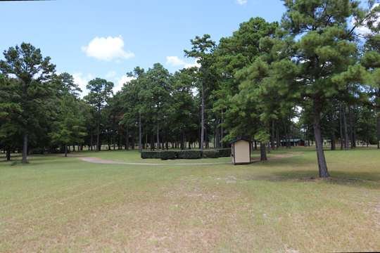 Original ticket booth among the pines
