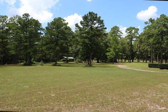 Original ticket booth among the pines