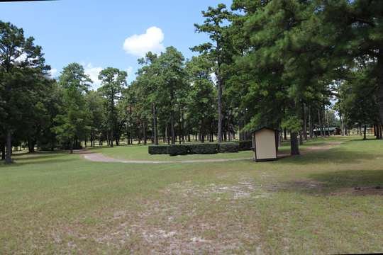 Original ticket booth among the pines