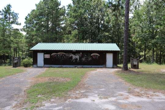 Park restroom building with George Jones Country mural