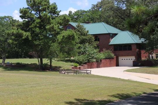 Garage and drive of the brick residence