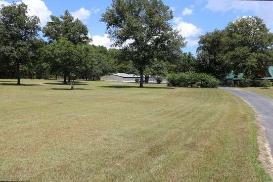 Open estate lawn with oaks